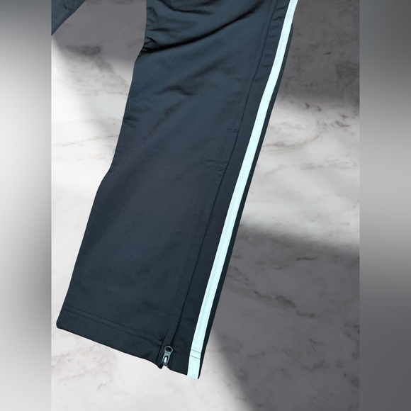 Adidas Black Joggers with White Accents and zipper on the bottom size Large. - Picture 5 of 5
